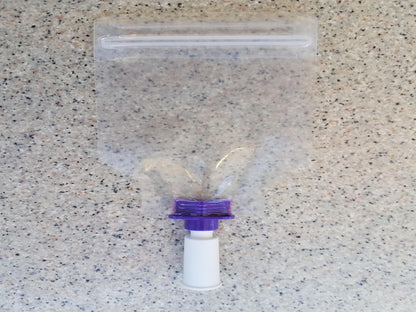 Female ENFit to Female Catheter Adapter Connected to Pill Pouch